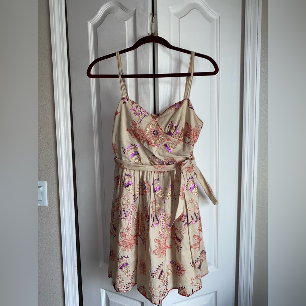 Chelsea & Violet Cream multi colored Pleated Wrap Mini Dress is a women’s Size S